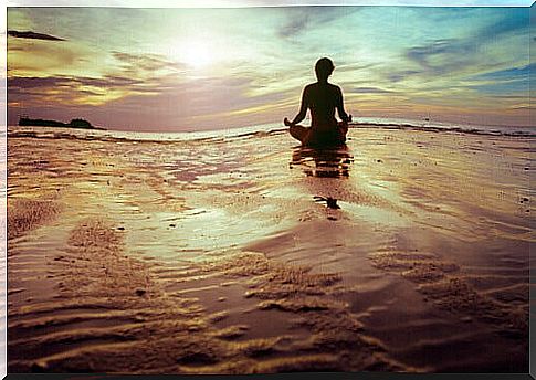 Person doing meditation representing techniques to self-regulate emotions