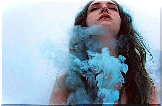 girl wrapped in smoke representing when you can't find the love of your life