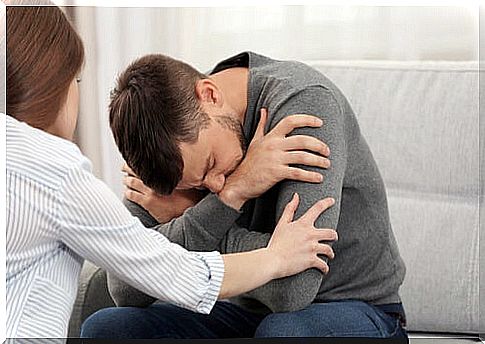 Crouched man representing how anxiety affects the quality of our relationships