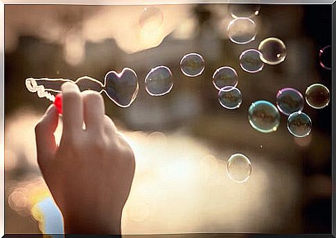 Soap bubbles with heart shapes