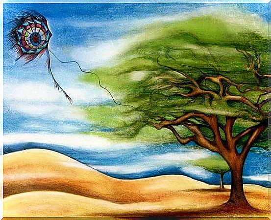 kite hooked to a tree