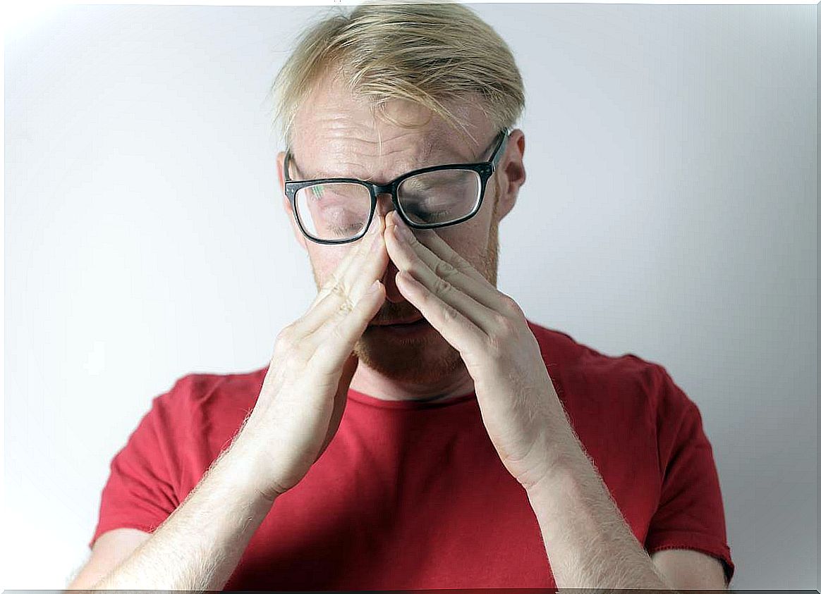 Man with glasses feeling like I'm overwhelmed