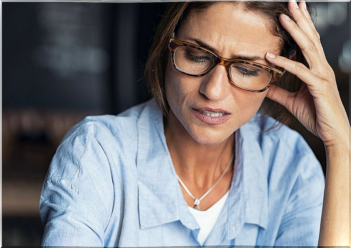 Stressed woman at home thinking that I am overwhelmed