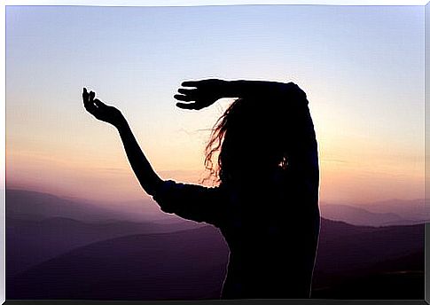 Woman dancing at dusk symbolizing how to find yourself