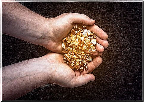 Hand with gold