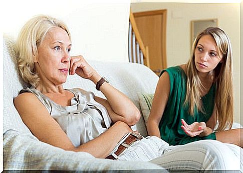 Mother having paradoxical communication with her daughter in the living room