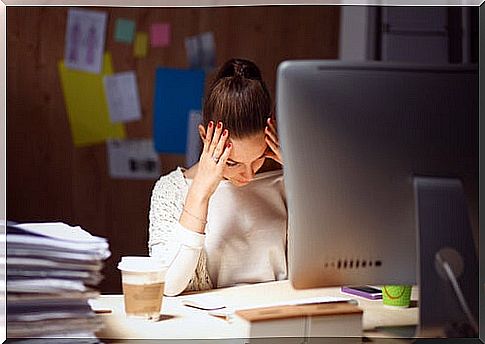 Young woman stressed out from her work