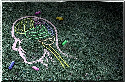 Chalk drawing of a head with brain to represent intellectual disability