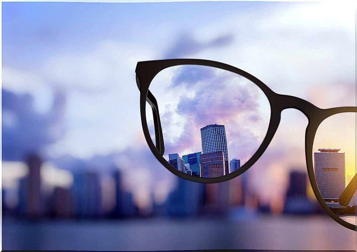 Glasses focusing on a city