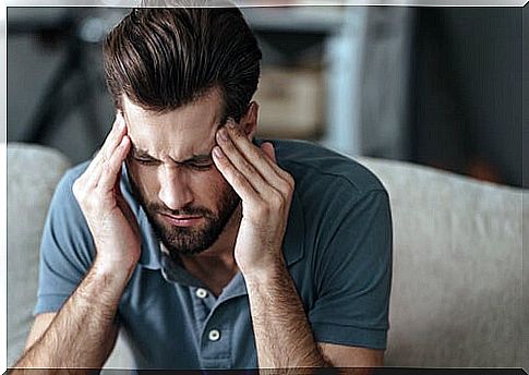 Man with headache from too much testosterone