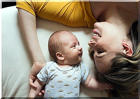 Baby looking at his mother