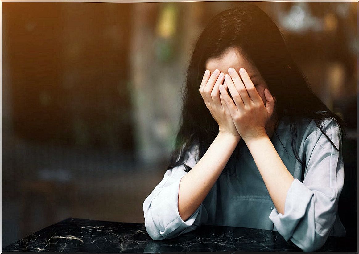 Sad and stressed Japanese woman