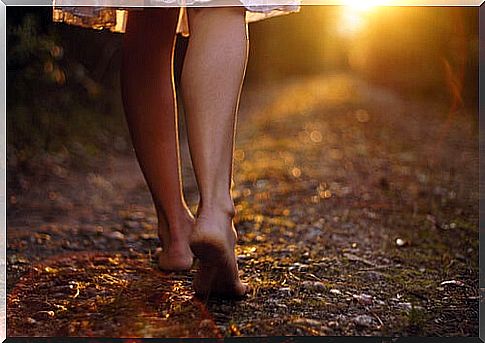 Woman walking the path of detachment