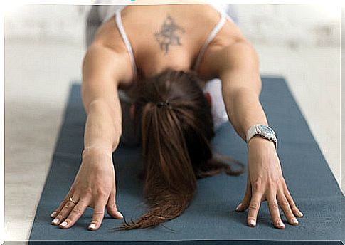 Woman doing an asana to demonstrate the relationship between yoga and depression